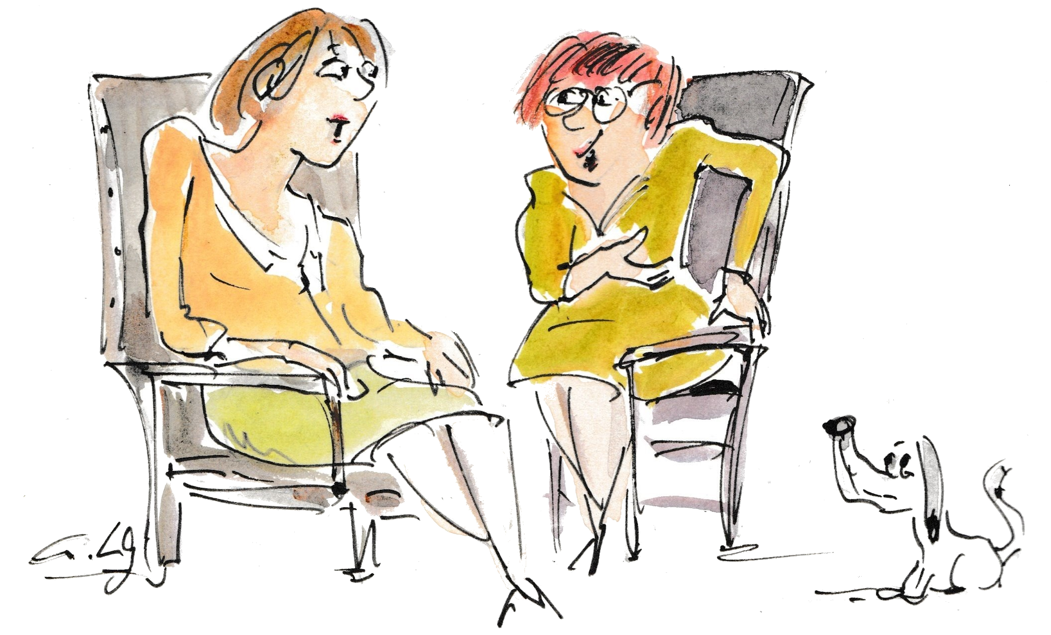 In einem Netzwerk-Coaching sitzen sich zwei Frauen gegenüber.